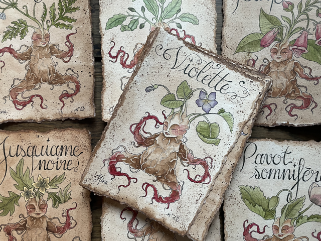 Sujet : Violette Original unique. Peinture à l'aquarelle sur papier 300gr, extraite de la série Mandraktober 2025 d'Hina Art.